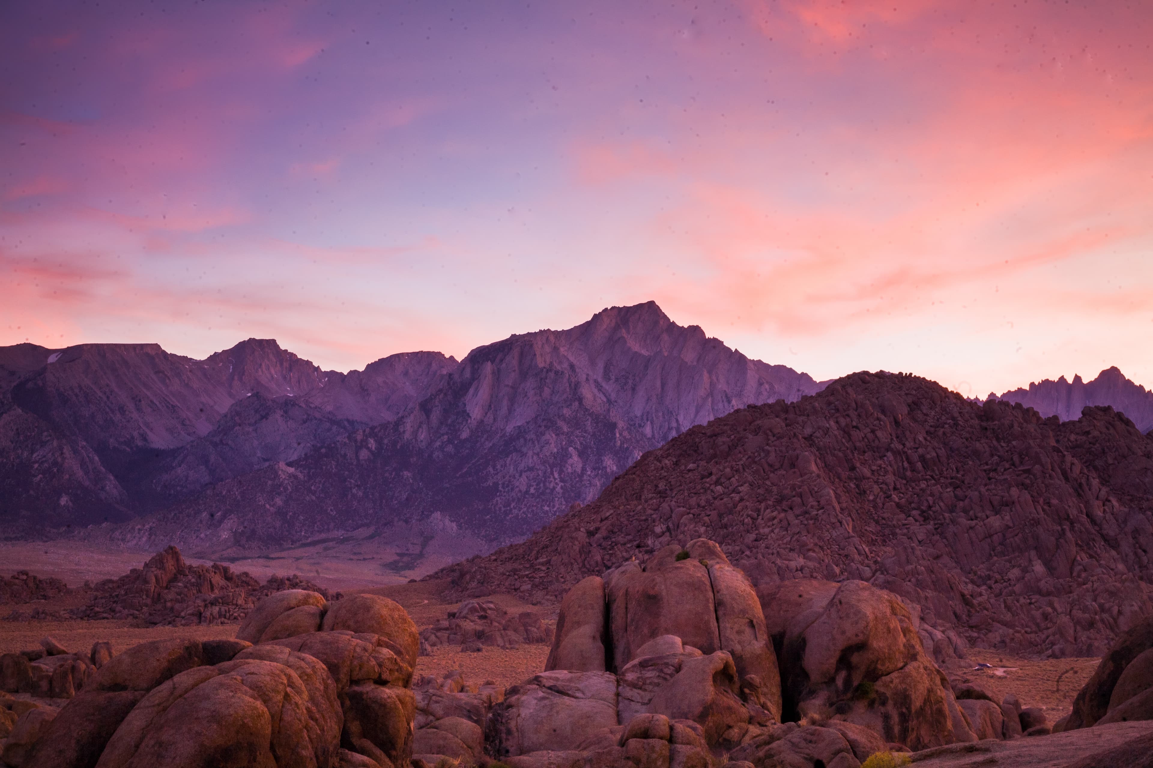Rounded Alabama Hills boulders beneath the Sierra Nevada at sunset